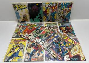 lot 319 image: Misc. Comics Including X-Men And More (In Protecive Sleeves On Card)