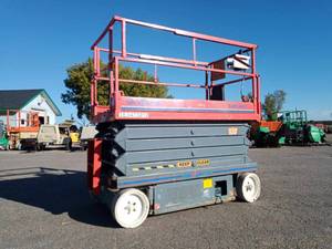 lot 14 image: 2012 Sky Jack Model SJ III 4632 Electric Scissors Lift