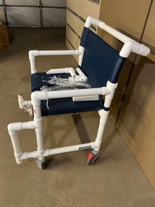 lot 23 image: NEW Innovative Products SCC750 Extra Wide Commode Bath Rolling Shower Chair - Has Damage On Front See Pictures