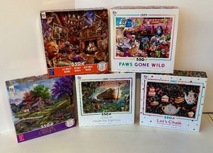 lot 240 image: 20 Cool Ceaco 550 Puzzles