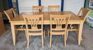 lot 6 image: Blonde Wood Dining Set by Ashley Furniture