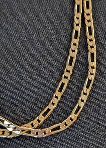 lot 43 image: 14k Gold Figaro Chain