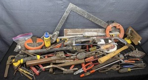 A Large Collection of Tools Including Pliers, Screwdrivers, Measuring Tapes and More