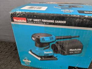 Brand New Makita 2 Amp Corded 14 Sheet Finishing Sander with 60G Paper, 100G Paper, 150G Paper, Dust Bag and Punch Plate