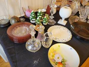 lot 40 image: Table full of vintage crystal, glass ,china, candle sticks, depression glass, cut and pressed glass, etc.