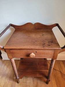 lot 48 image: Rare antique Jenny Lind maple wash stand.