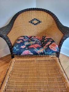 lot 51 image: Diamond Back Wicker Armchair with matching Footstool.