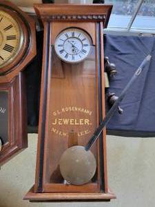 lot 55 image: Jewelers Regulator and School House Clocks & box of parts. Not tested for working condition.