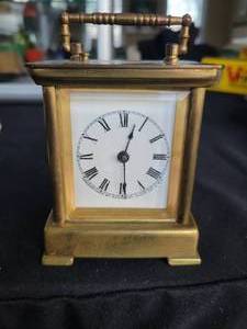 lot 75 image: Antique Waterbury Carriage Clock.