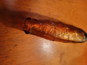 lot 78 image: Rare Faust Company Antique Amber Cigar Whisky Flask Bottle.