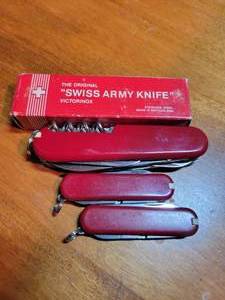 lot 79 image: Vintage Swiss Army Knives ( Officer Suisse with box) & 2 others.