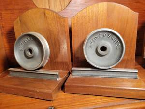 lot 94 image: A set of Griffen E O S Wheel bookends.