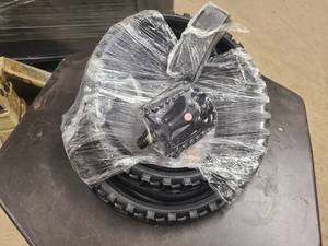 lot 3 image: MM Replacement bike tire, pedals and extra bits