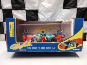lot 94 image: Action Jeff Gordon #24 DuPont Pit Stop Show Case 124th Scale Die Cast