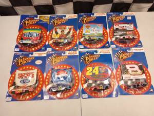lot 104 image: Action Winners Circle Collectors Card & 164th Scale Die Cast Cars