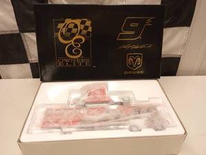 lot 129 image: Owners Elite Kasey Kahne #9 Dodge Dealers Transporter Bank 164th Scale Die Cast
