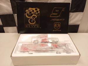 lot 130 image: Owners Elite Kasey Kahne #9 Dodge Dealers Transporter Bank 164th Scale Die Cast