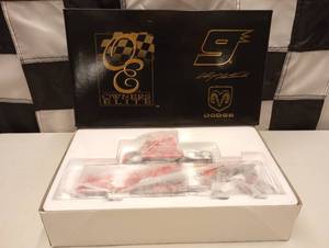 lot 131 image: Owners Elite Kasey Kahne #9 Dodge Dealers Transporter Bank 164th Scale Die Cast