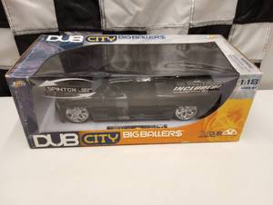 lot 150 image: Dub City Big Ballers Chevrolet Silverado 118th Scale Die Cast Truck