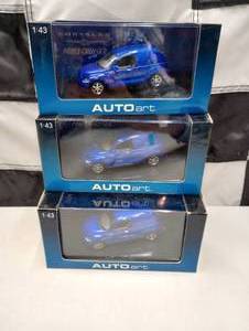 lot 176 image: Autoart Chrysler Panel Cruiser143rd Scale Die Cast Cars