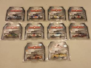 lot 236 image: Team Caliber Pit Stop 164th Scale Die Cast Cars