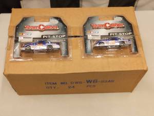 lot 244 image: (24) Team Caliber Pit Stop  #99 Aarons 164th Scale Die Cast Cars