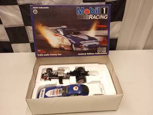 lot 255 image: Whit Bazemore Mobil 1 Funny Car 124th Scale Die Cast