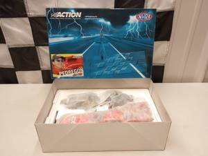 lot 266 image: Action Cruz Pedregon  Advance Auto Parts Funny Car 124th Scale Die Cast