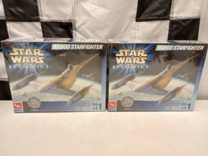 lot 314 image: Ertl AMT Star Wars Episode 1 Naboo Starfighter 148th Scale Die Cast Model Kit