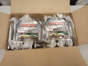 lot 243 image: (24) Team Caliber Pit Stop #14 Waste Management 164th Scale Die Cast Cars