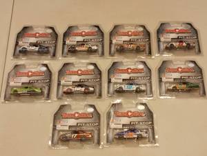 lot 216 image: Team Caliber Pit Stop 164th Scale Die Cast Cars