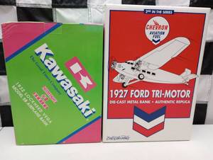 lot 327 image: Ertl Collectible $ Kawasaki Airplane Die Cast Coin Banks