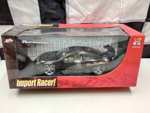 lot 430 image: Jada Toys Import Racer Toyota Celica 118th Scale Die Cast Car.
