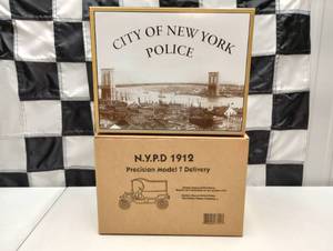 lot 434 image: Gearbox Collectible NYPD 1912 Ford Model T Delivery Truck 116th Scale Die Cast