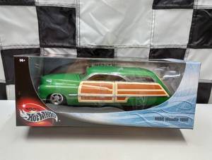 lot 438 image: Hot Wheels 1950 Merc Woodie 118th Scale Die Cast Car
