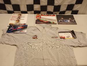 lot 548 image: Autographed Hero Card & Race used Shirt with COA