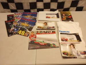 lot 551 image: Fernandez Racing Souvenirs & Crew Tee Shirt With COA