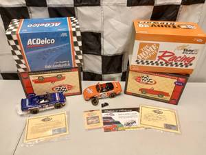 lot 558 image: (2) Nascar Pedal car Banks One With COA