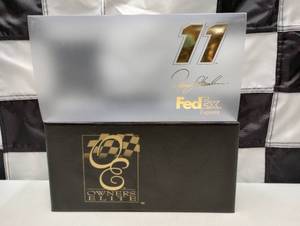 lot 581 image: Owners Elite Denny Hamlin #11 FedEx 124th Scale Die Cast Car