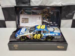 lot 582 image: Owners Elite Jimmie Johnson #48 Lowes 124th Scale Die Cast Car