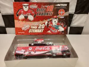 lot 633 image: Action Bobby Labonte Tony Stewart Interstate Batteries  Home Depot  Transporter 164th Scale Die Cast