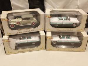 lot 642 image: Signature Models 143rd Scale Die Cast Cars