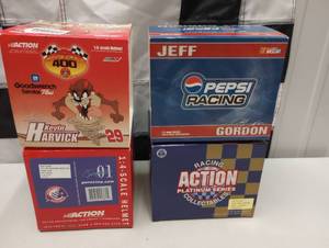 lot 647 image: Action 14th Scale Helmets