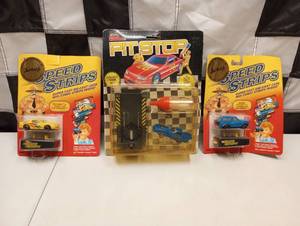 lot 694 image: (2) Ertl Speed Strips from the Fred Ertl Collection & (1) Racing Champion Pit Stop Blue Max