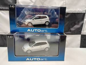 lot 843 image: (2) Autoart Volkswagon Polo 143rd Scale Die Cast Car