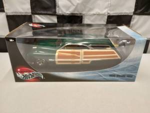 lot 851 image: Hot Wheels 1950 Merc Woodie 118th Scale Die Cast Car