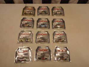 lot 948 image: Team Caliber Pit Stop 164th Scale Die Cast Cars