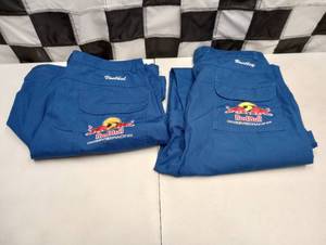 lot 973 image: Race Used Red Bull Cheever Racing Shorts & Pants With COA