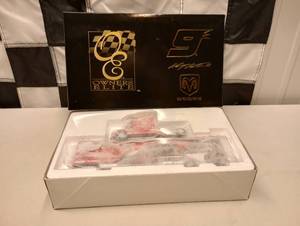 lot 981 image: Owners Elite Kasey Kahne #9 Dodge Dealers Transporter Bank 164th Scale Die Cast