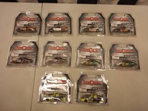 lot 940 image: Team Caliber Pit Stop 164th Scale Die Cast Cars